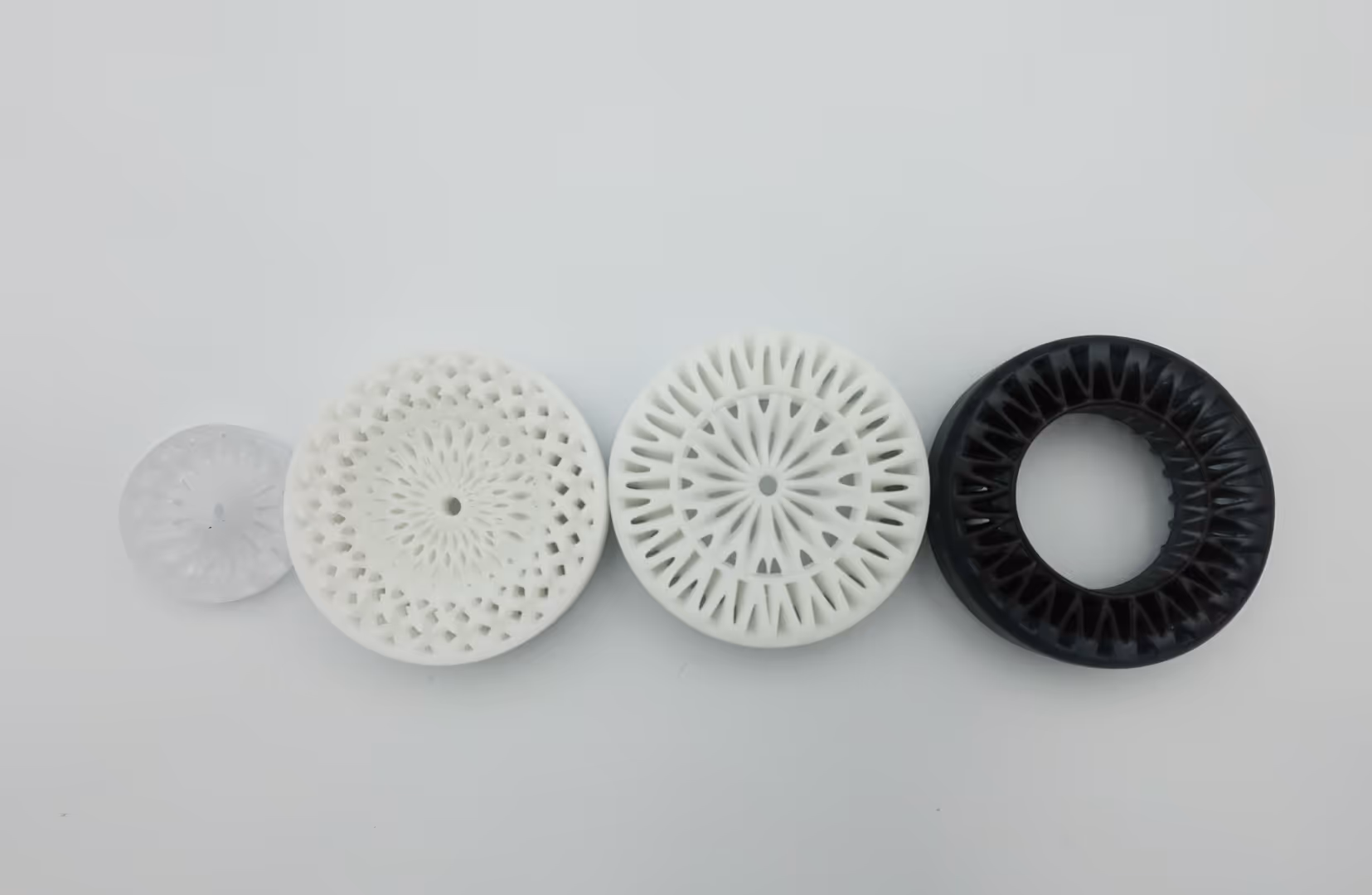 3D printed decorative wheels arranged in a row